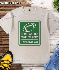 Football-themed washed t-shirt with 'Hot If We Can Complete A Pass' signboard design, perfect for sports enthusiasts.