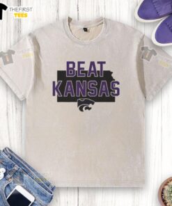 Alt Text: Hot Kansas State Wildcats Beat Kansas slogan washed t-shirt featuring bold graphics and team colors.