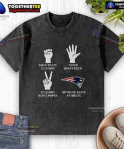 Alt Text: New England Patriots football logo on a washed t-shirt, perfect for fans showcasing team spirit and comfort.
