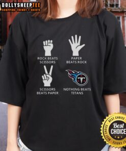 Alt Text: Stylish ladies tee featuring the Tennessee Titans football logo, perfect for passionate fans and game day attire.