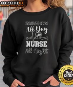 Hot Philadelphia Eagles football fan wearing an all-day nurse all-night sweatshirt, showcasing team spirit and style.