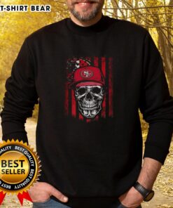 Alt Text: Hot San Francisco 49ers NFL sweatshirt featuring a skull design with an American flag, perfect for football lovers.