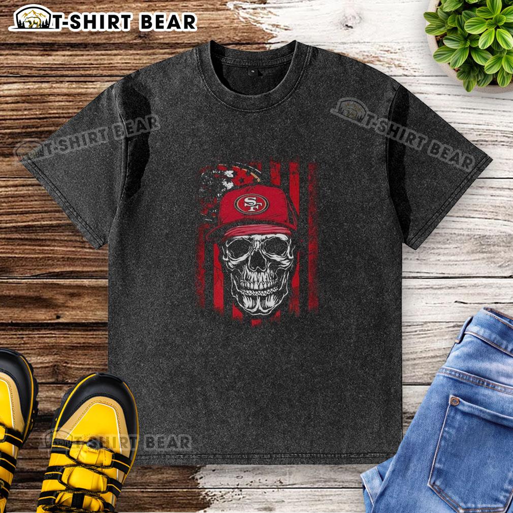 Hot San Francisco 49Ers Nfl Skull American Flag Footaball Lover Washed T Shirt Hot San Francisco 49ers NFL skull graphic on American flag washed t-shirt for football lovers.