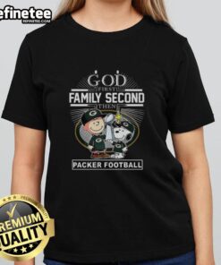 Hot Snoopy and Charlie Brown tee featuring 'God First, Family Second, Then Green Bay Packers Football' design.