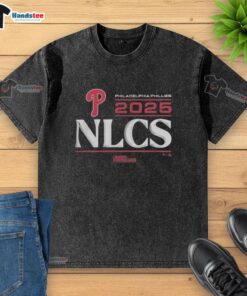 Alt Text: Official Philadelphia Phillies 2025 Division Series Winner locker room washed t-shirt displayed on a hanger.