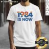 Nice 1984 Is Now T-Shirt featuring retro design and vibrant colors, perfect for vintage fashion enthusiasts.