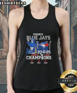 Alt Text: Toronto Blue Jays mascot tank top celebrating the 2025 American League Champions with city skyline design.