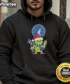 Holiday hoodie featuring Nice 2025 Minnesota Timberwolves design with Grinch and Santa hat for festive fans.