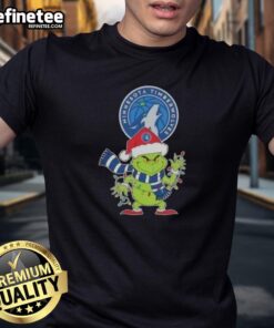 2025 Minnesota Timberwolves Christmas Grinch Santa Hat T-Shirt, perfect holiday apparel for fans and festive occasions.