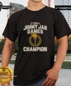 Alt Text: Nice 7th Annual Jimmy Jab Games Champion T-Shirt featuring vibrant design and official event branding.