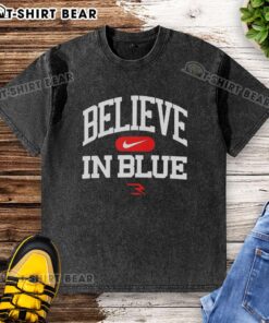 Nice Believe In Blue Washed T-Shirt displayed on a hanger, showcasing its stylish design and soft fabric.