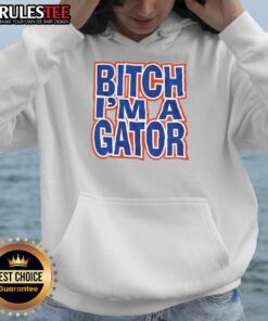 Stylish 'Nice Bitch I'm a Gator' hoodie featuring bold text and a vibrant design, perfect for casual wear.