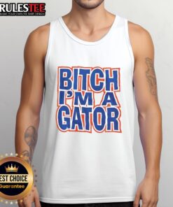 Stylish 'Nice Bitch I'm A Gator' tank top featuring a playful alligator graphic, perfect for casual summer outfits.