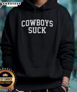 Fan wearing a 'Cowboys Suck' hoodie at the Nice Chiefs vs Lions game, showcasing team spirit and excitement.