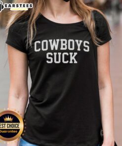 Women wearing 'Cowboys Suck' tee at Nice Chiefs vs Lions game, showcasing team spirit and football enthusiasm.