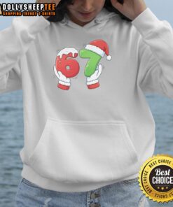 Santa Claus hands wearing a festive hoodie in Nice Christmas meme, perfect for holiday humor and cheer.