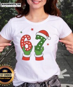 Santa Claus hands holding a festive gift on a Nice Christmas 67 Six Seven ladies' tee shirt design.