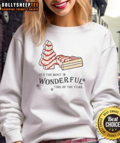 Cozy sweatshirt featuring a Christmas tree cake design, perfect for the most wonderful time of the year.