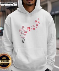 Nice dandelion flower design on a Nebraska Huskers football logo hoodie, perfect for fans and nature lovers.