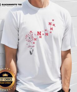 Alt Text: Nice Dandelion Flower Nebraska Huskers Football Logo T-Shirt featuring vibrant design and team spirit for fans.