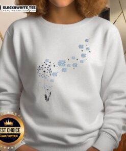 Alt Text: Nice dandelion flower design on UNC Tar Heels football logo sweatshirt, perfect for fans and casual wear.