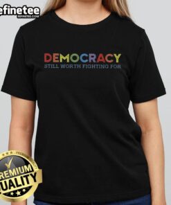 Ladies tee featuring 'Nice Democracy Still Worth Fighting For' slogan, promoting civic engagement and advocacy.