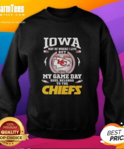 Cozy Kansas City Chiefs sweatshirt shining under Iowa sunshine, showcasing team spirit and comfort outdoors.