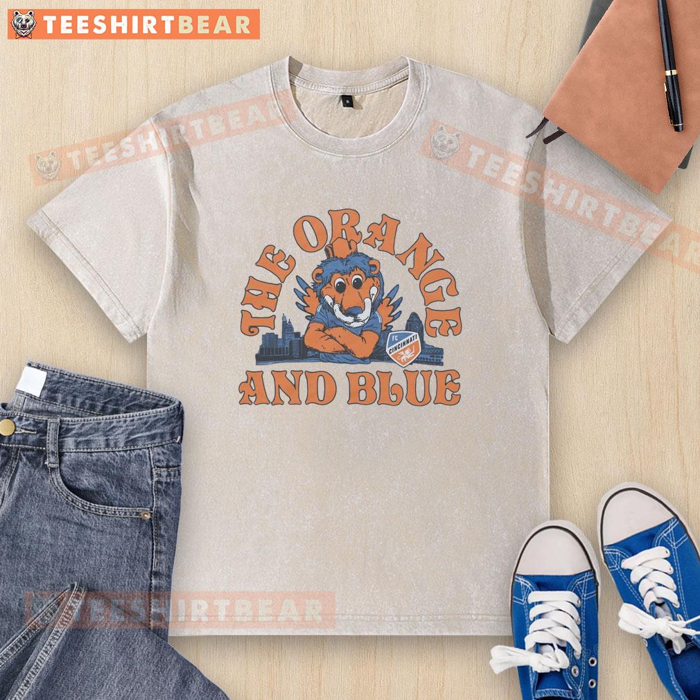 Nice Fc Cincinnati The Orange And Blue Washed T Shirt Nice FC Cincinnati Orange and Blue washed t-shirt featuring the club logo, perfect for fans and casual wear.