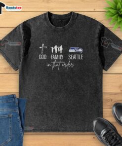 Family wearing Seattle Seahawks washed t-shirts, showcasing their love for the team in a cheerful outdoor setting.