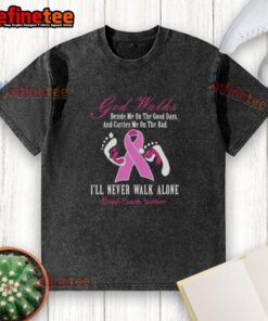Breast cancer warrior in a washed t-shirt with 'Nice God Walks Beside Me' design, symbolizing hope and strength.