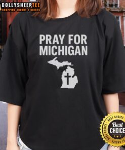 Prayer ladies wearing Nice Grand Blanc Michigan Shooting tees, showcasing community support and unity in a heartfelt moment.