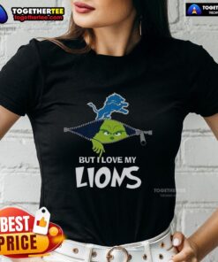 Alt Text: Ladies tee featuring a Grinch design with 'I Hate People But I Love My Detroit Lions' for Christmas fans.