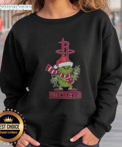 Nice Houston Rockets Christmas Grinch Santa Hat sweatshirt for the holiday season 2025, perfect for fans and festive wear.