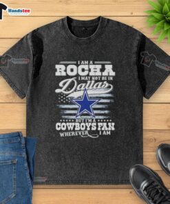 Washed t-shirt featuring 'I May Not Be In Dallas But I'm A Cowboys Fan' slogan, perfect for dedicated fans.