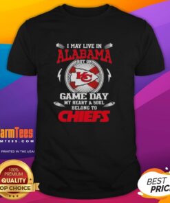 Fan wearing 'I May Live In Alabama But On Game Day My Heart Belongs To Kansas City Chiefs' T-Shirt at a game.