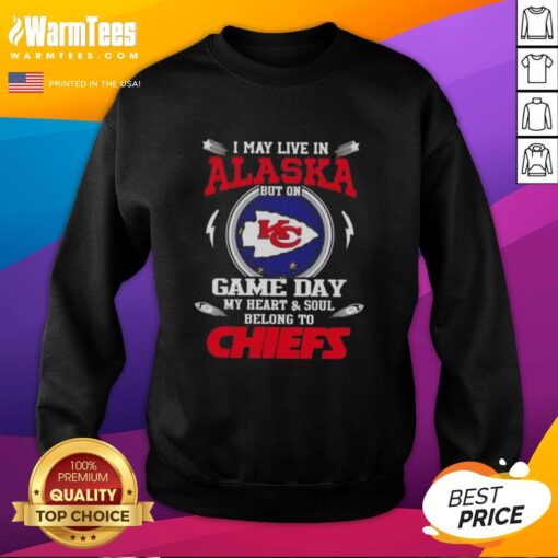 Alt Text: Cozy sweatshirt featuring I May Live In Alaska But On Game Day My Heart Belongs To Kansas City Chiefs design.