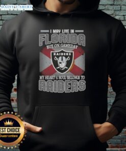 Person wearing a Raiders hoodie with text 'I May Live In Florida But On Gameday My Heart Belongs To Raiders'.