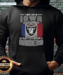 Person wearing a Raiders hoodie in Iowa, showcasing pride with 'Gameday My Heart and Soul Belongs to Raiders' design.