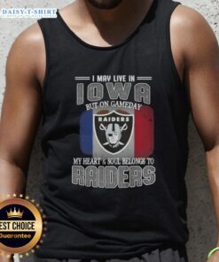Stylish tank top featuring 'I may live in Iowa, but on game day my heart belongs to Raiders' design.