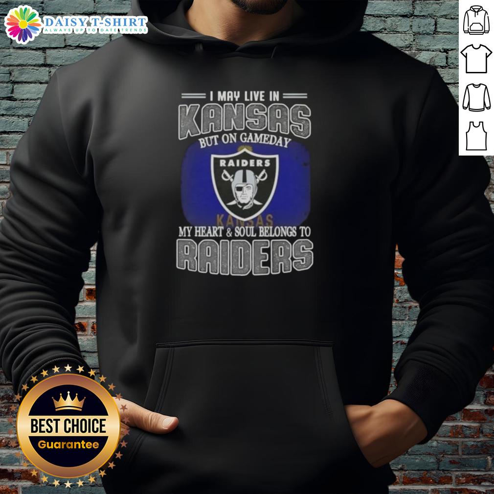 Nice I May Live In Kansas But On Gameday My Heart And Soul Belongs To Raiders Hoodie Fan wearing a Raiders hoodie, showcasing pride with the caption 'I May Live In Kansas, But My Heart Belongs To Raiders'.