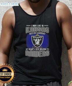 Stylish tank top reading 'I May Live In Kansas, But On Gameday My Heart Belongs To Raiders' for fans.