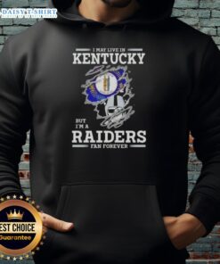 Alt Text: Raiders fan wearing a hoodie that says 'Nice, I May Live in Kentucky But I'm a Raiders Fan Forever.'