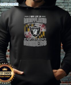 Person wearing a Raiders hoodie, showcasing team spirit in Maryland on game day, heart and soul dedicated to the Raiders.