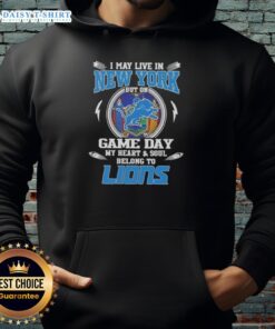 Person wearing a Detroit Lions hoodie, showcasing pride for the team on game day despite living in New York.