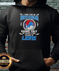 Detroit Lions hoodie with text 'Nice, I may live in North Carolina, but my heart belongs to Detroit Lions' on display.