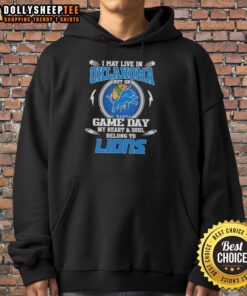 Person wearing a Detroit Lions hoodie, showcasing pride for the team despite living in Oklahoma on game day.