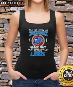 Alt Text: Stylish tank top with 'I may live in Tennessee, but my heart belongs to Detroit Lions' graphic design.