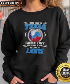 Detroit Lions sweatshirt with 'I may live in Texas but my heart belongs to Detroit' slogan on display.