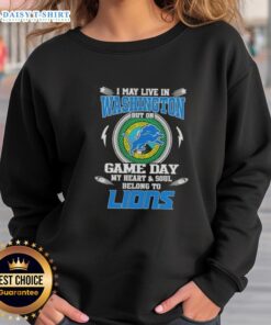 Alt Text: Cozy sweatshirt with I May Live in Washington, But My Heart Belongs to Detroit Lions printed, perfect for game day.