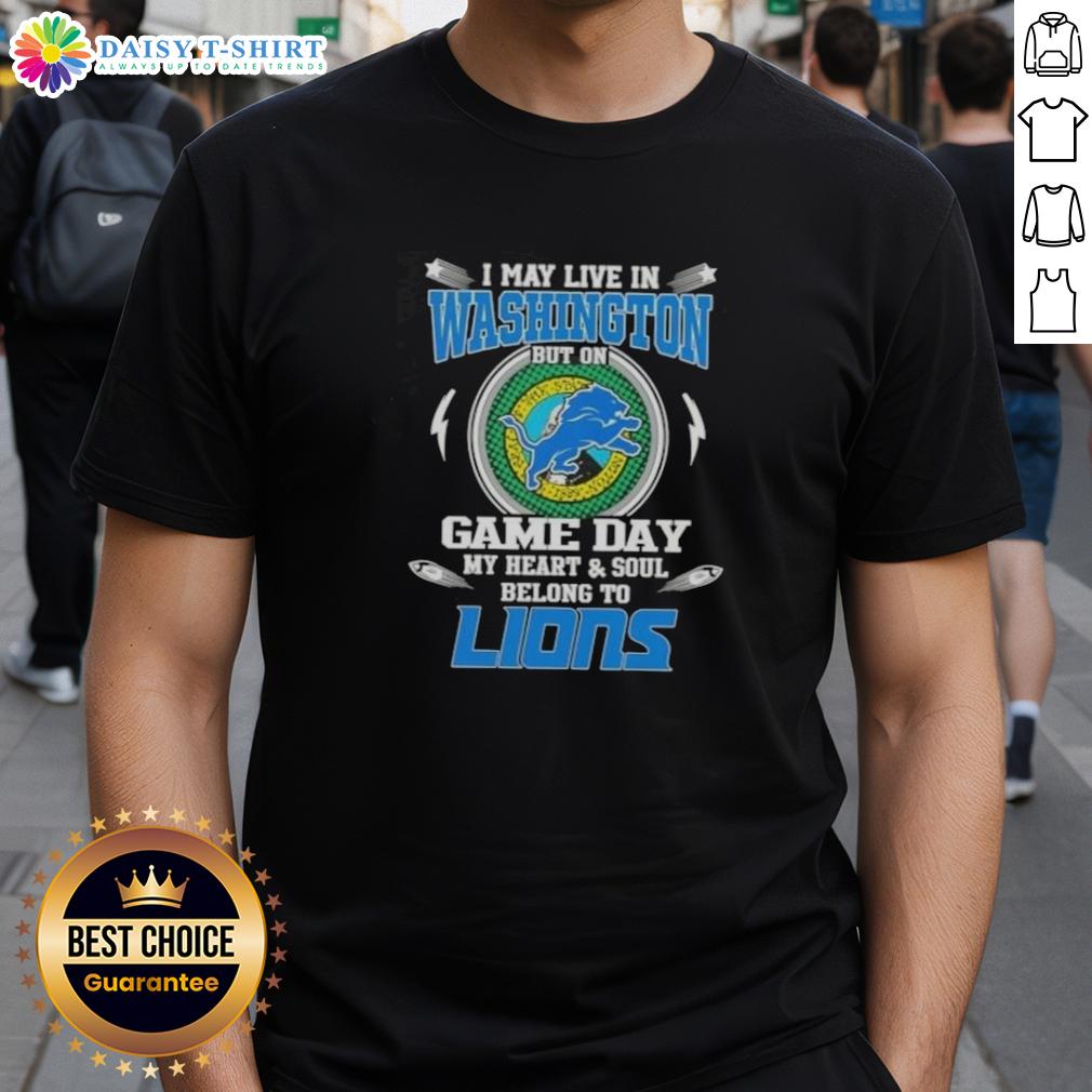 Nice I May Live In Washington But On Game Day My Heart And Soul Belongs To Detroit Lions T-Shirt Alt Text: Detroit Lions T-shirt with 'I May Live In Washington But My Heart Belongs To Detroit Lions' slogan on display.